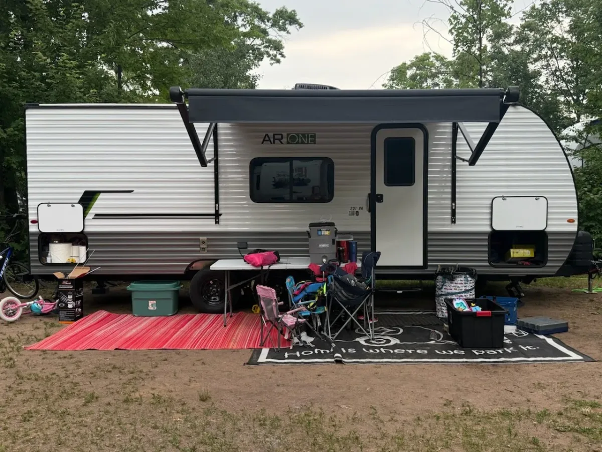 Our 27ft camper setup at a campsite