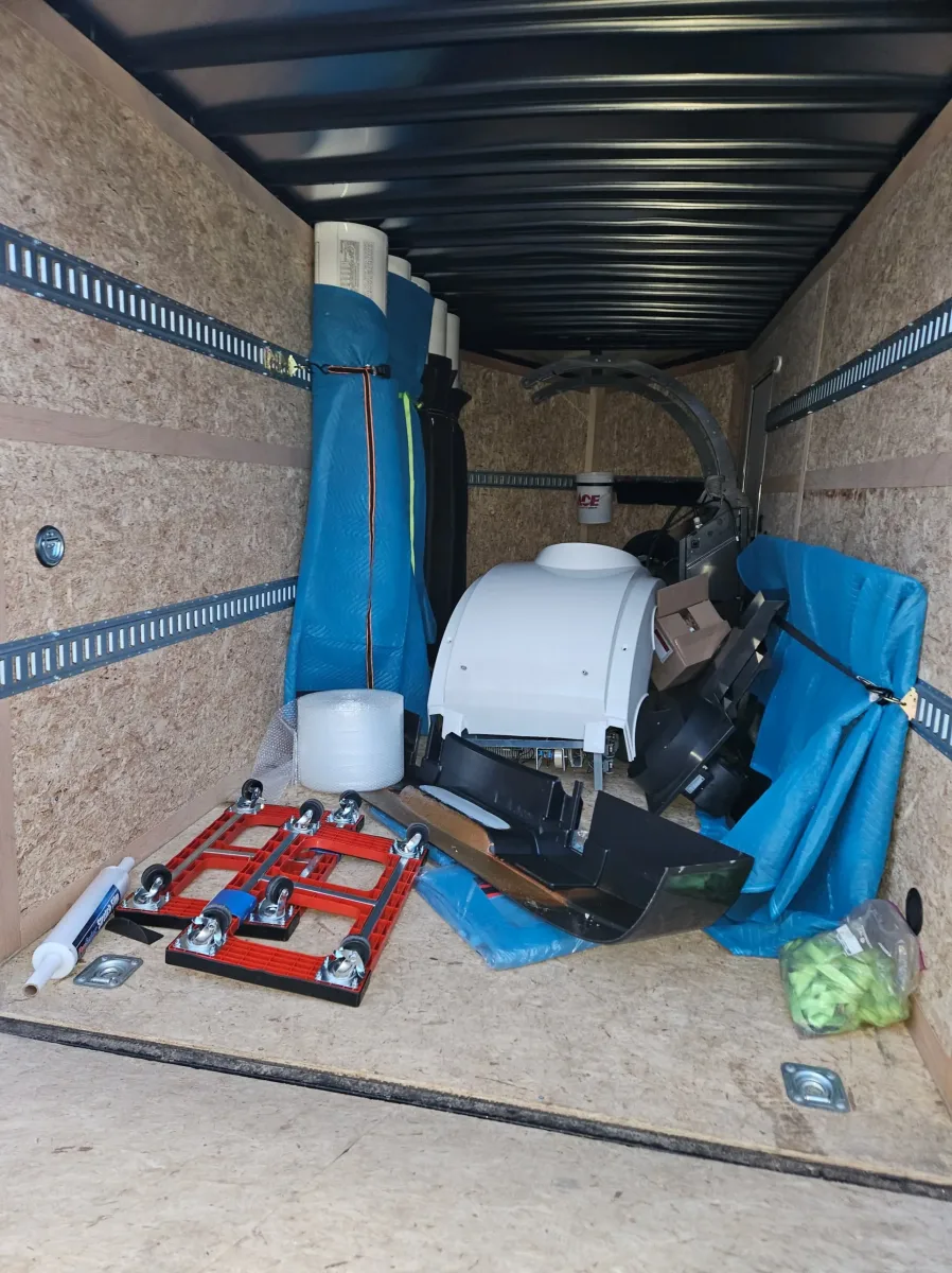 Moving tanning bed supplies in our 7x16' enclosed trailer