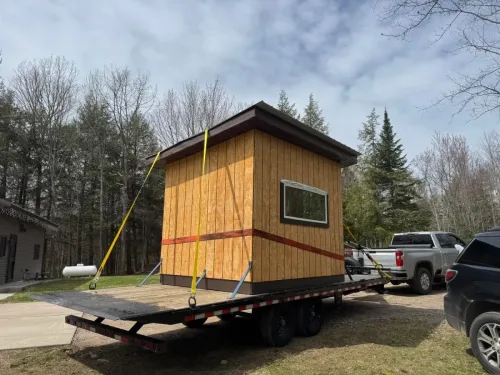 Shed on our 24ft deckover tilt trailer