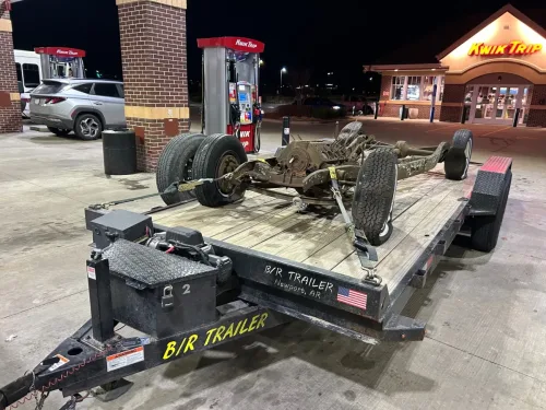 Old Ford rolling chassis on our 20ft flatbed trailer