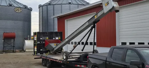 Farm equipment on our 24ft deckover trailer
