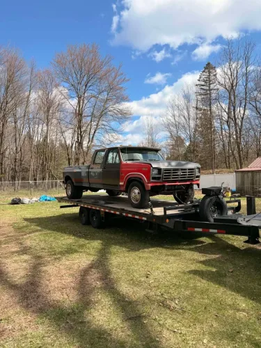 Dually Chevy on our 24ft deckover tilt trailer