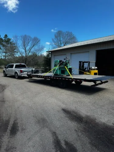 Lathe on our 24ft deckover tilt trailer