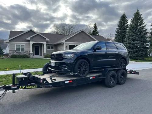 Dodge Durango on our 20ft flatbed trailer