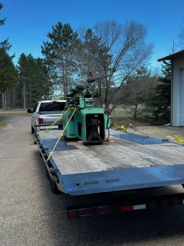 Lathe on our 24ft deckover tilt trailer