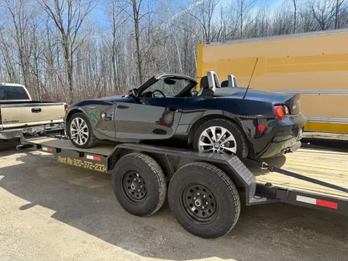 BMW convertible on 20ft car hauler trailer