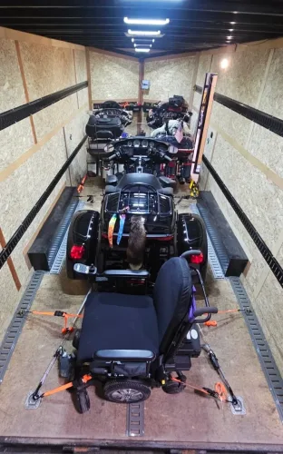 2 motorcycles, 1 trike, and a wheel chair in our 20ft enclosed trailer