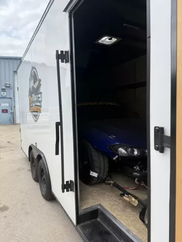 Nissan in 8.5x20' enclosed trailer