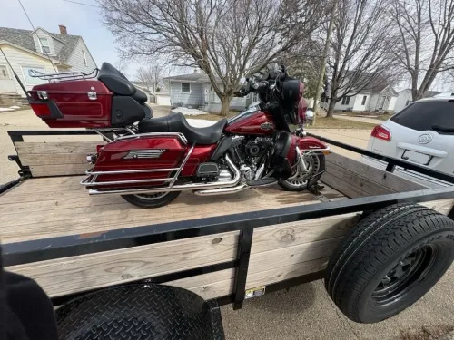 Harley Davidson motorcycle in our 12' utility trailer with motorcycle wheel chock