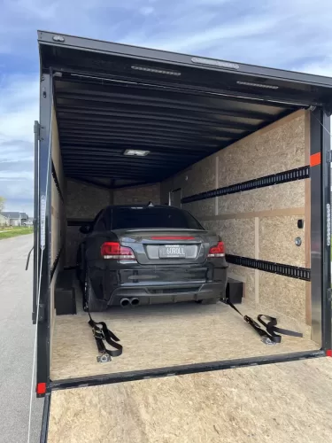 BMW 135i in 8.5x20' enclosed trailer