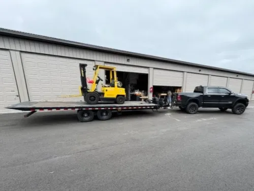 Hyster forklift on our 24ft deckover tilt trailer