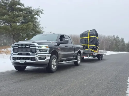 Large mill on our 24ft deckover tilt trailer