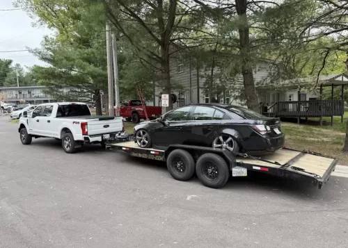 Slammed Chevy Cruze on 20ft car hauler trailer