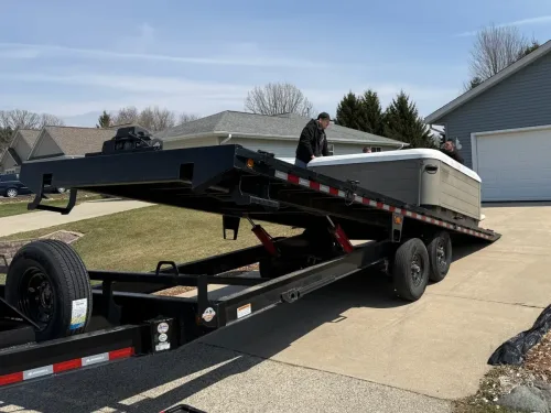 Large hot tub being loaded on our 24ft deckover trailer