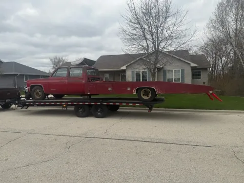 R3500 ramp truck on our 24ft deckover tilt trailer