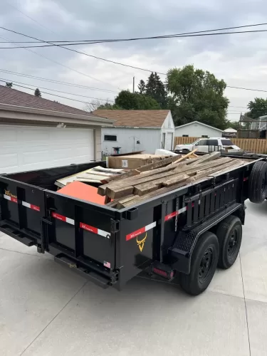 Junk in 7x14' dump trailer