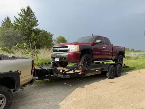 Chevy Silverado 1500 on 20ft car hauler trailer