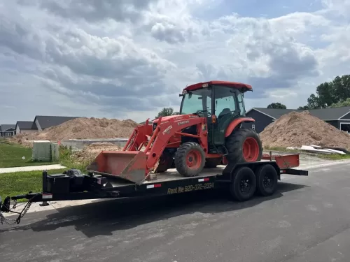 Kabota tractor on 20ft car hauler trailer