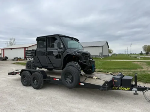 6-seater SXS UTV on our 20ft flatbed trailer