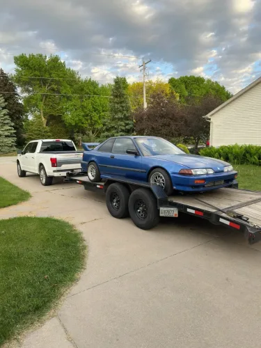 Honda Accord on our 20ft flatbed trailer