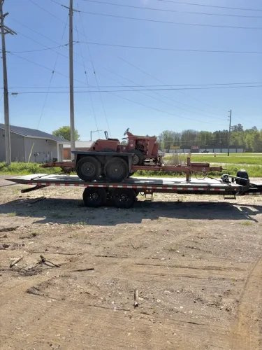 Ditch witch and trailer on our 24' deckover trailer