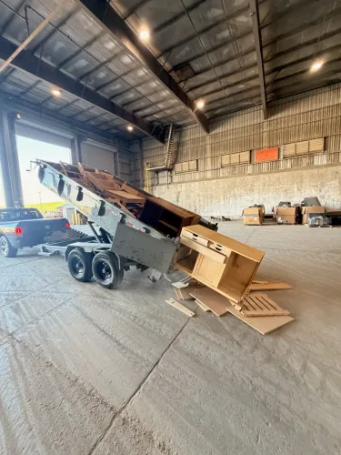 Our 7x14' dump trailer unloading at the dump