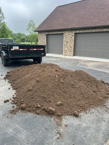 Our 7x14' dump trailer delivering topsoil
