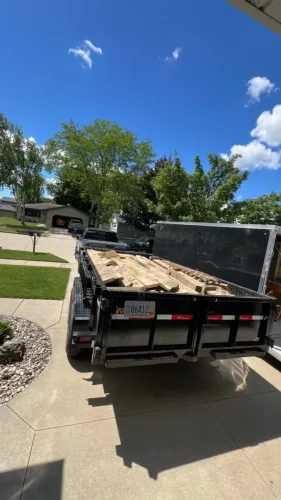 Our 7x14' dump trailer hauling lumber