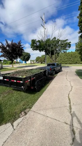Our 7x14' dump trailer hauling brush
