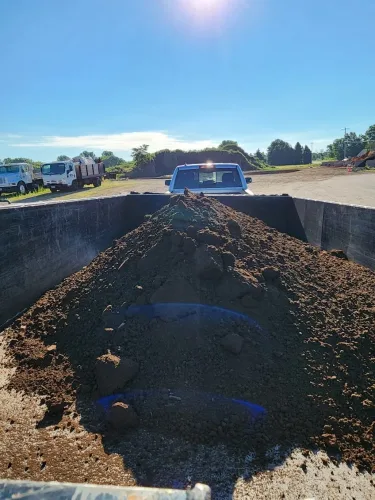 Our 7x14' dump trailer hauling dirt