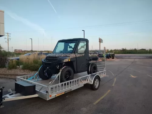 Polaris Ranger UTV on 14’ aluminum utility trailer