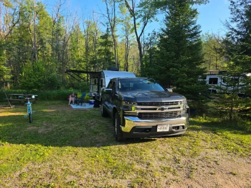 Our 21ft camper setup at a campsite