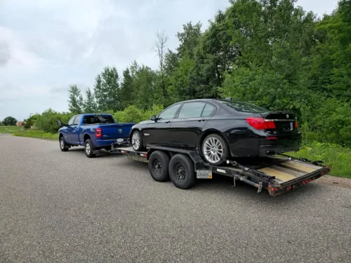 Our 20ft flatbed trailer hauling a BMW