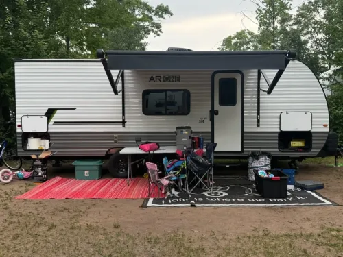 Our 27ft camper setup at a campsite