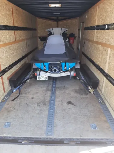 A jetski and trailer in our 8.5x20' enclosed trailer