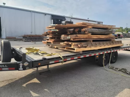 Hauling wood on 24ft deckover trailer