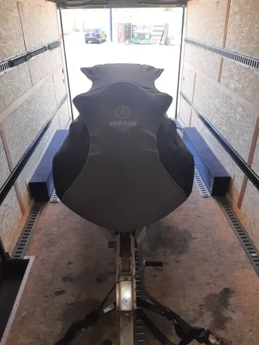 Our 8.5x20' enclosed trailer hauling a jetski and trailer