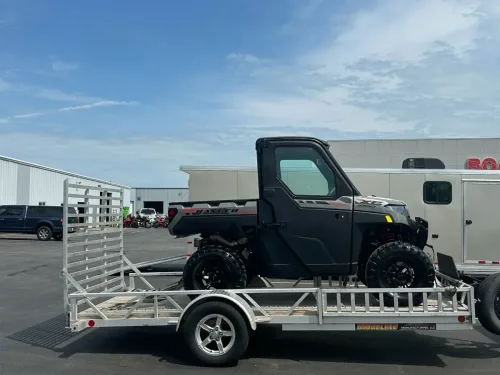 Our 14ft utility trailer hauling a UTV