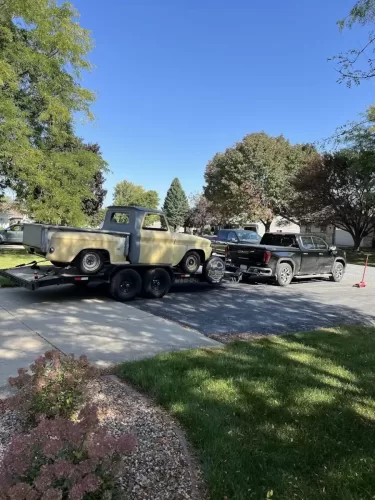 Old truck on 20ft car hauler trailer