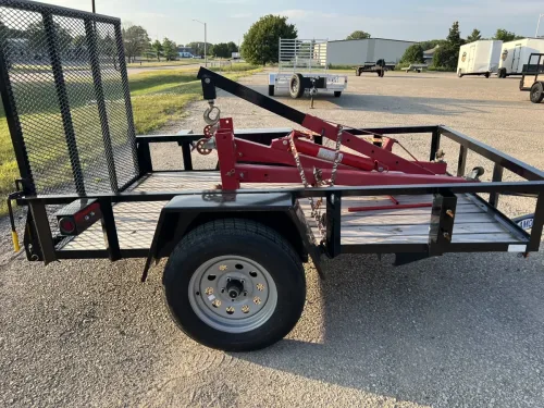 Our 5x8' utility trailer hauling a cherry picker engine hoist