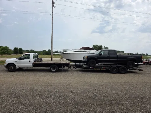 Our 20ft flatbed trailer hauling a truck