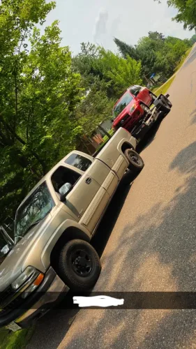 Our 20ft flatbed trailer hauling an SUV