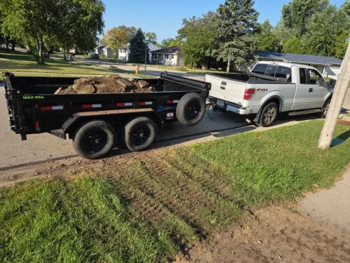 Our 6x12' dump trailer hauling some fill/concrete