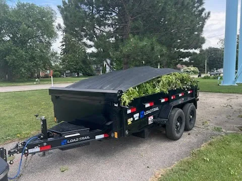 Our 6x12' dump trailer hauling some vegetation