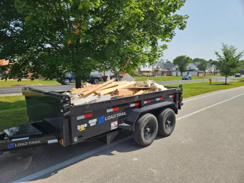 Our 6x12' dump trailer hauling some junk
