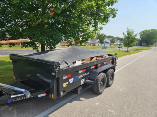 Our 6x12' dump trailer hauling some junk