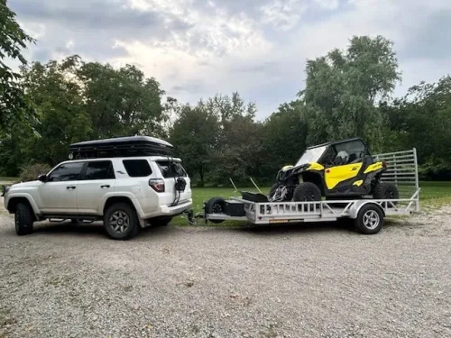 Our 14' utility trailer hauling a SXS