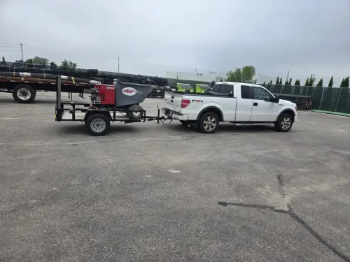 Our 5x8' utility trailer hauling a concrete buggy