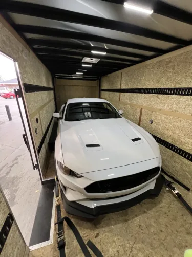 Ford Mustang in our 8.5x20' enclosed trailer