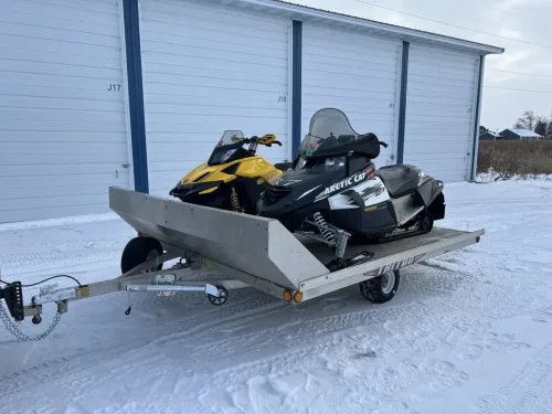 Snowmobiles on our 2-place snowmobile trailer